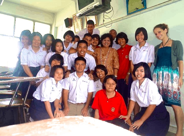 Nina as an English teacher with all her students in Thailand.