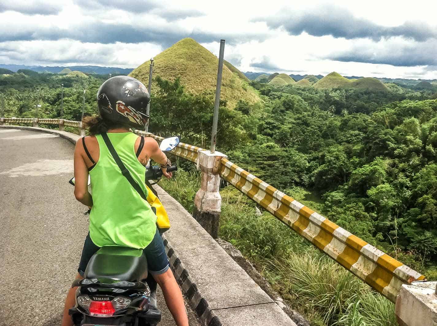 Motorbiking around the Chocolate Hills in Bohol while backpacking in Southeast Asia