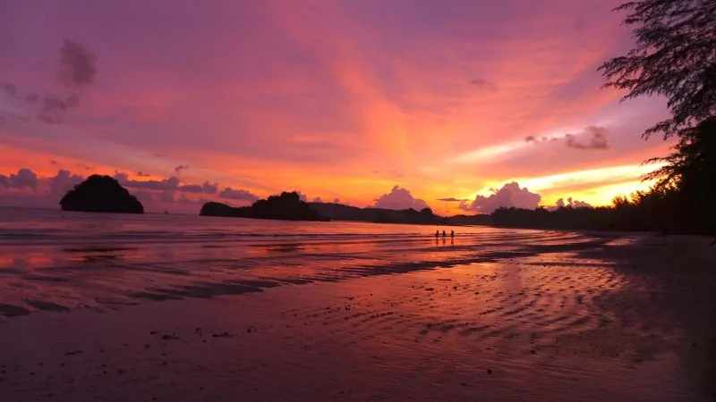 catching a sunset while chilling on ao nang in krabi, Thailand