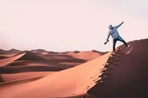 Freelance videographer in a desert