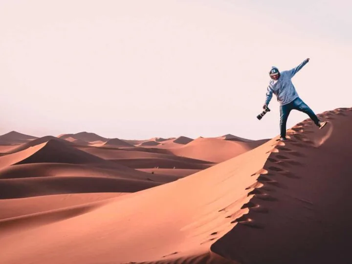 Freelance videographer in a desert