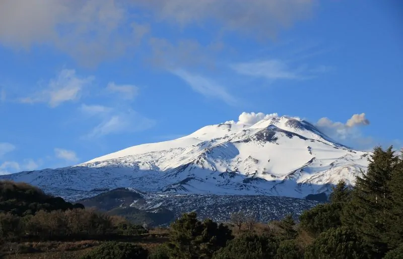 Towering over the eastern Sicily, Mount Etna is one of the world's most iconic volcanoes.