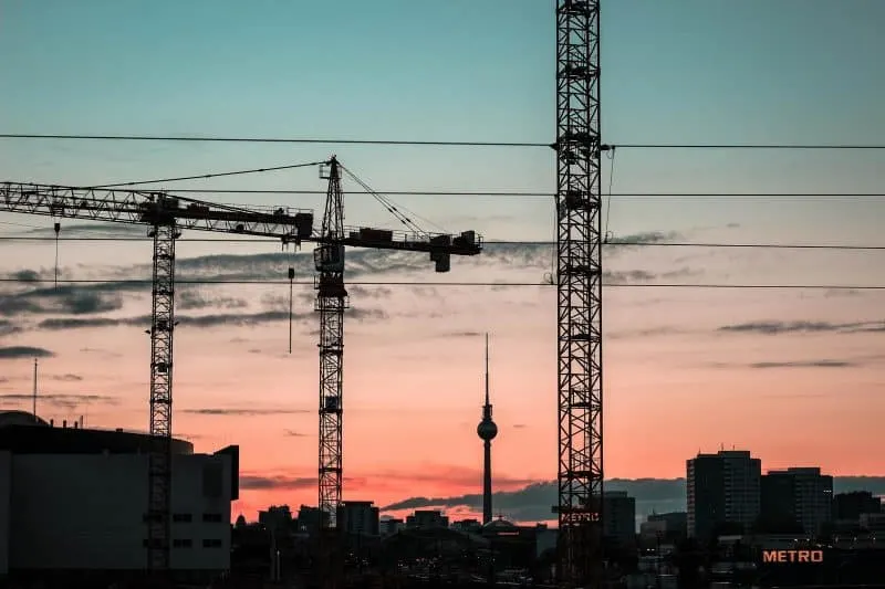 A constructions crane at sunset.