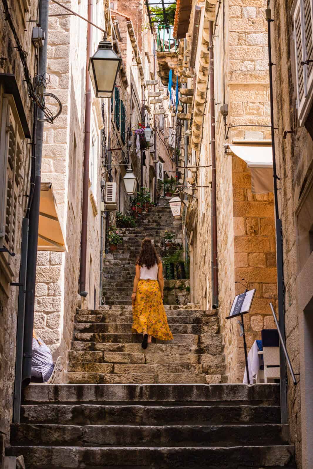 Woman on the stairs in Dubrovnik