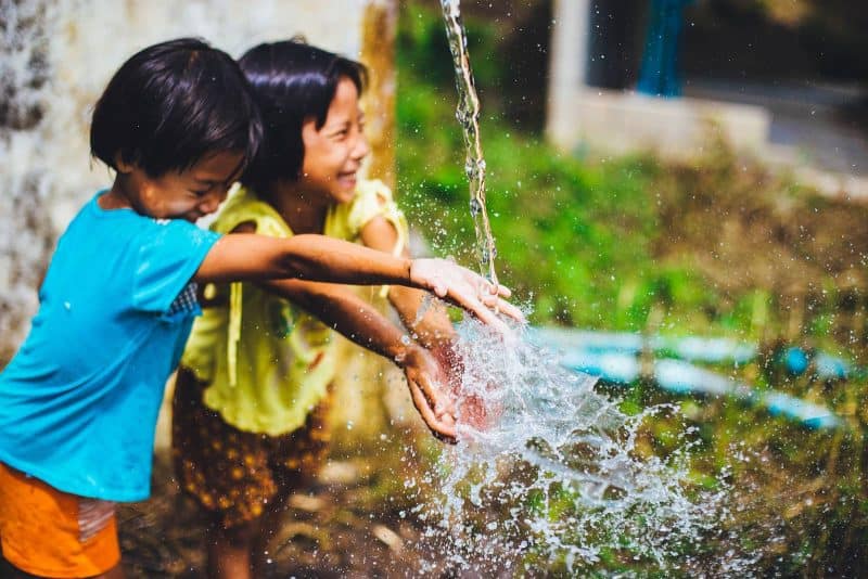 children playing water