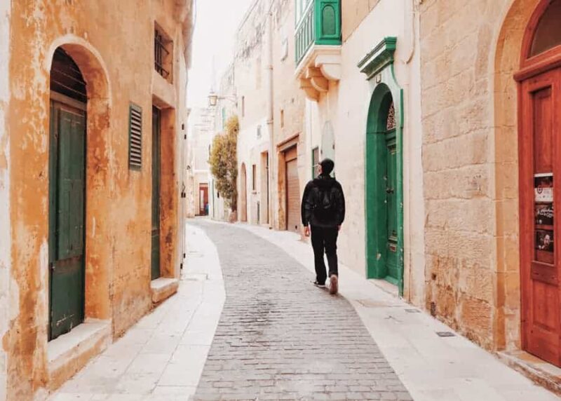 A man walking down a street while teaching english abroad without a degree