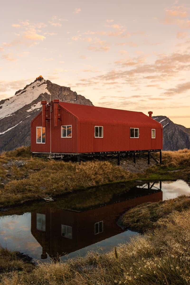 French ridge hut sunset reflection