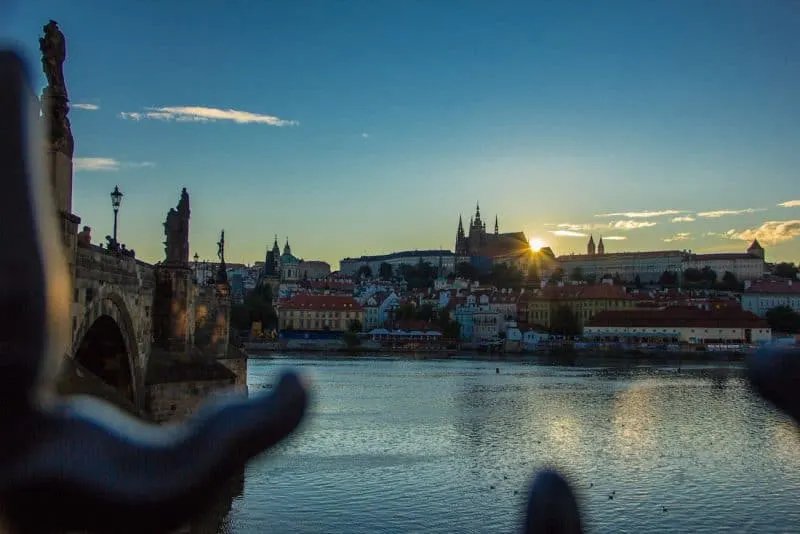 sunset over Prague castle from Charles bridge