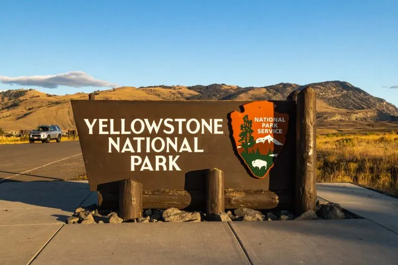 A sign for Yellowstone National Park — add this photo stop to your Yellowstone itinerary