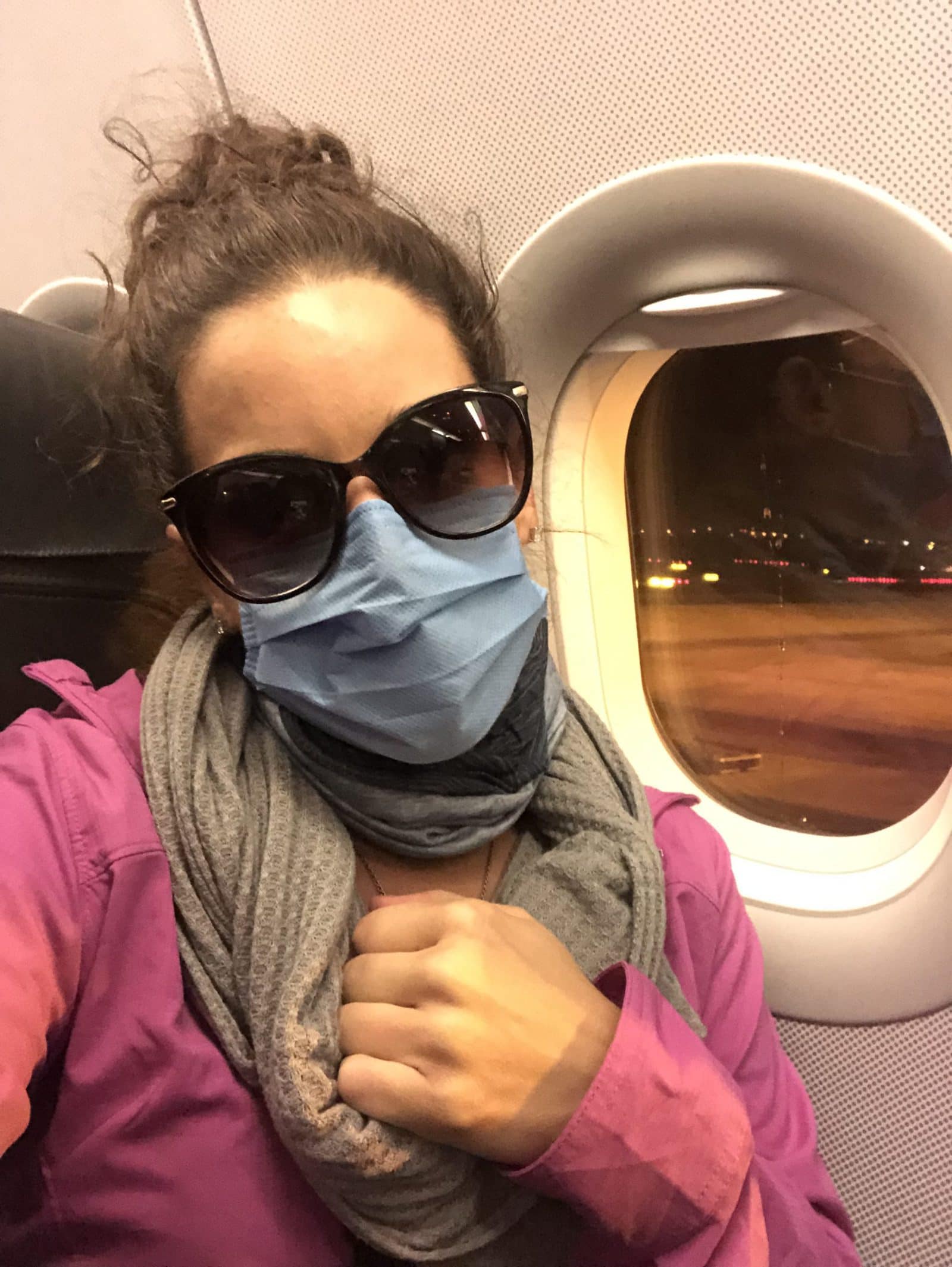 Me on a flight during the pandemic