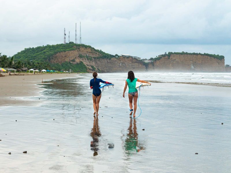 Surfers in Olon near Montanita, Ecuador