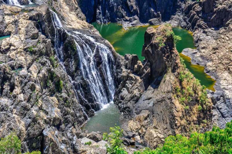 Aerial view of waterfall and rocky surrounds at Barron Gorge, one of the best things to do in Cairns