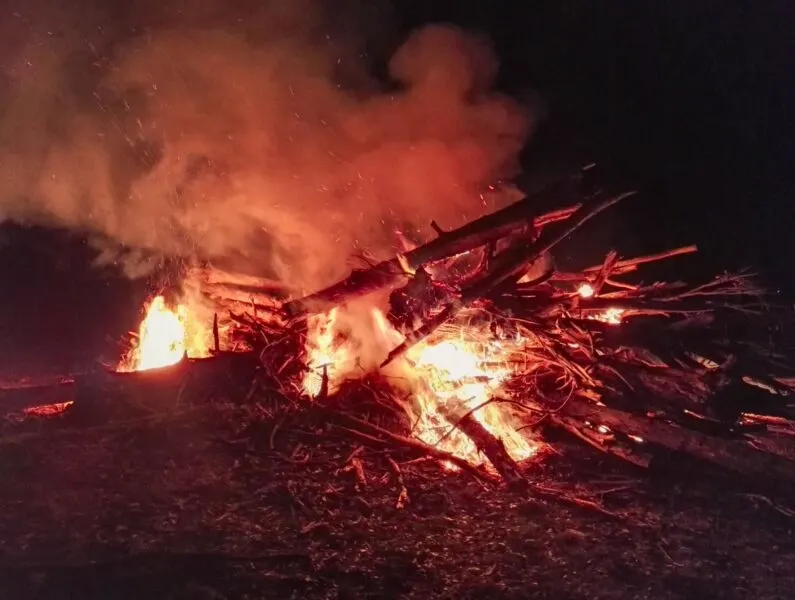 Bonfire at night to celebrate the harvest season for farm work in Australia