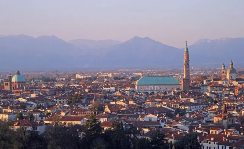 Aerial view over Vicenza just after sunset with lots of historic buildings - Vicenza is one of the best day trips from Venice