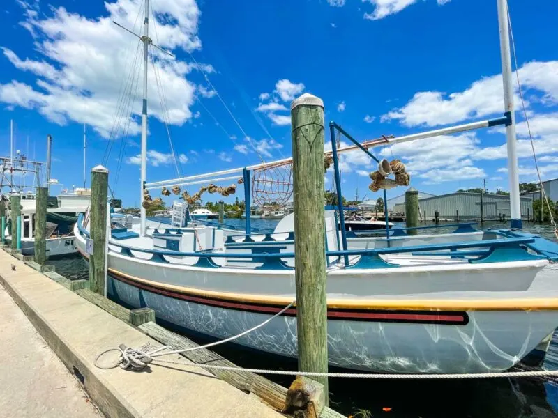 Boat tied to post in marina in Tarpon Springs