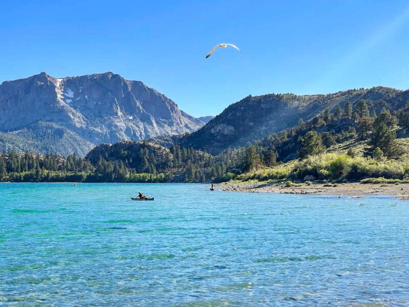 Person kayak on June Lakes, California on a California road trip