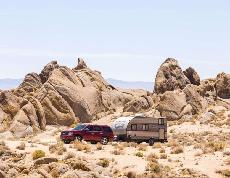 RV in front of rocks on a California road trip