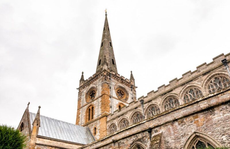 Church spire in Avon working in the UK as a foreigner