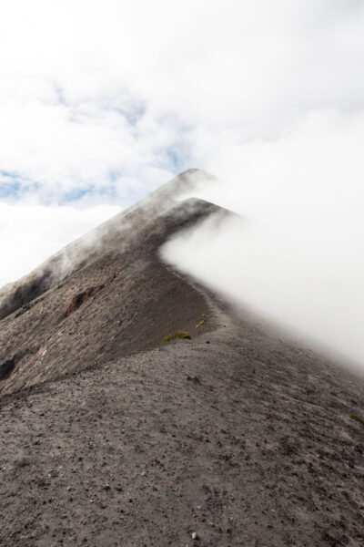 Fog over ridge on Fuego volcano near Antigua Guatemala