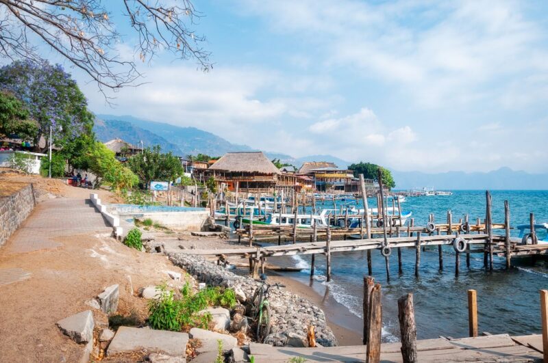 Wooden jetty and beach huts at Panajachel on Lake Atitlan, Guatemala