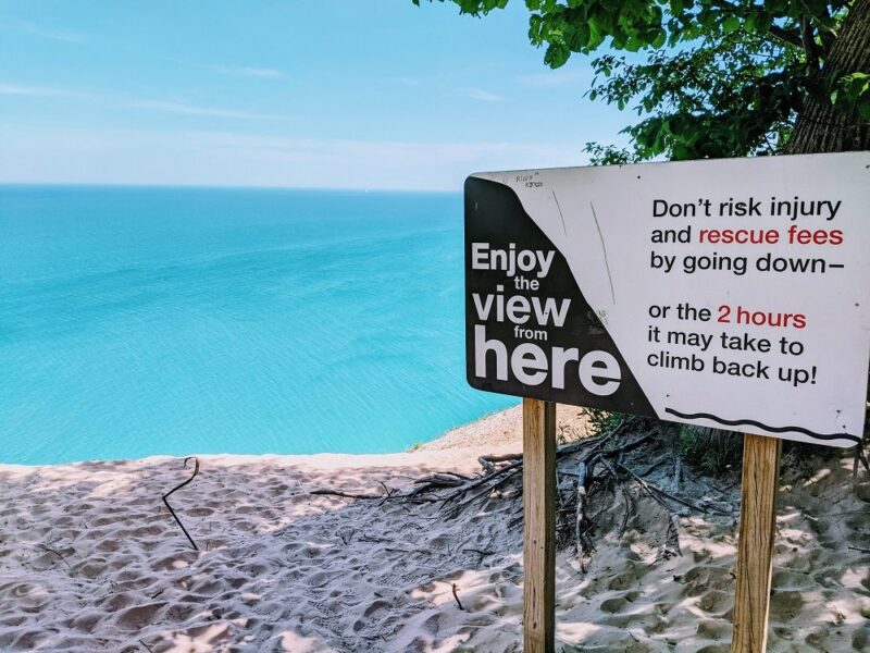 Warning sign at Pyramid Point one of the best hikes in Northern Michigan