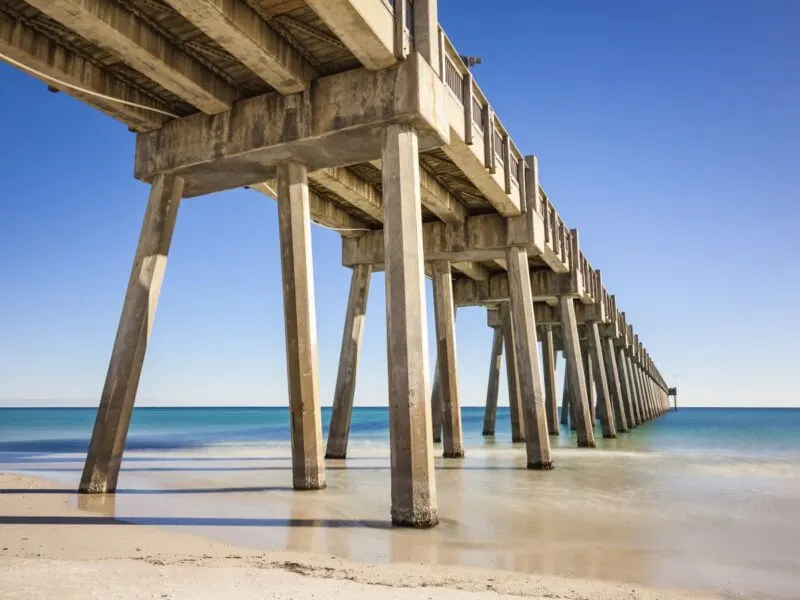 View under pier at Pensacola Beach for things to do in North Florida
