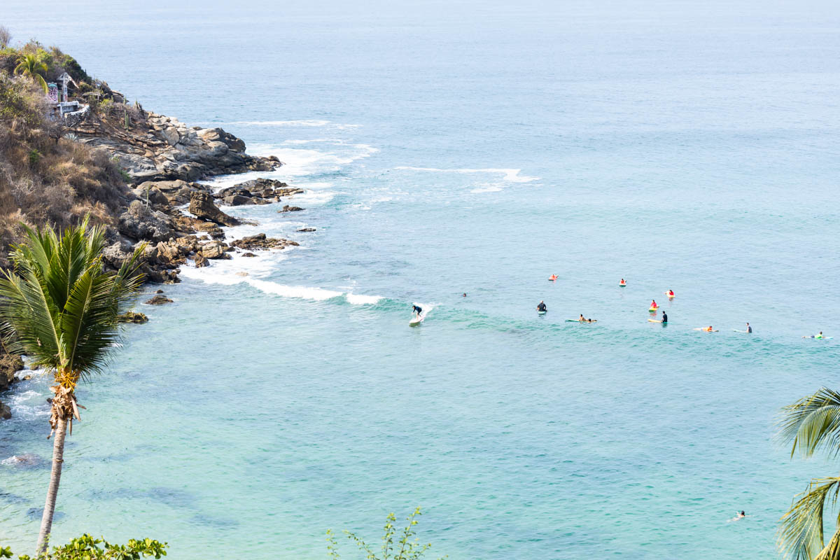 Overhead view of surfers at Playa Carrizalillo.