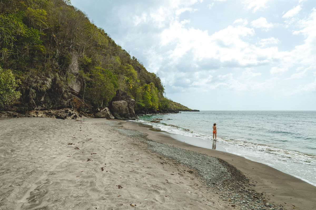 Woman in water at Anse Galet beache in S. Lucia.