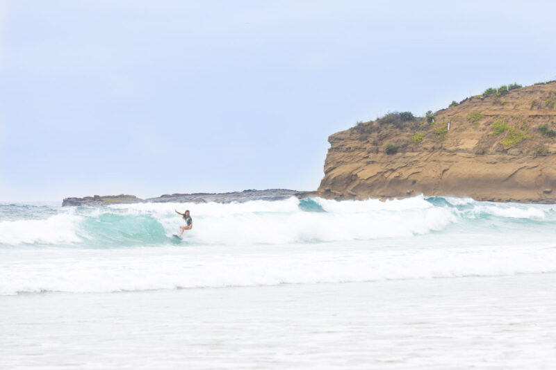 Surfer at La Punta beach in Montanita