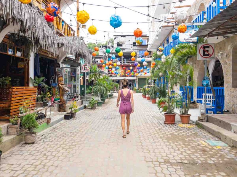 Woman walking in Montanita street