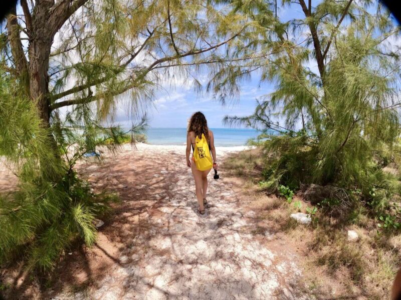 Woman with drybag Caribbean island hopping