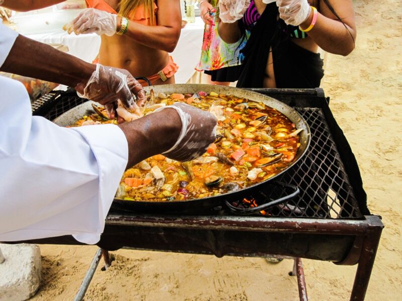 Cooking street food on the beach Caribbean island hopping