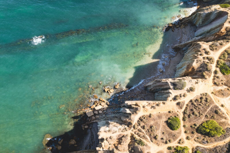 Aerial view of coastal hiking trails on an Algarve itinerary