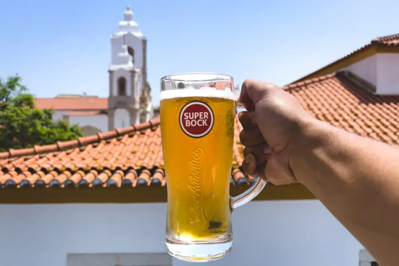 Beer on rooftop bar in Lagos on an Algarve itinerary