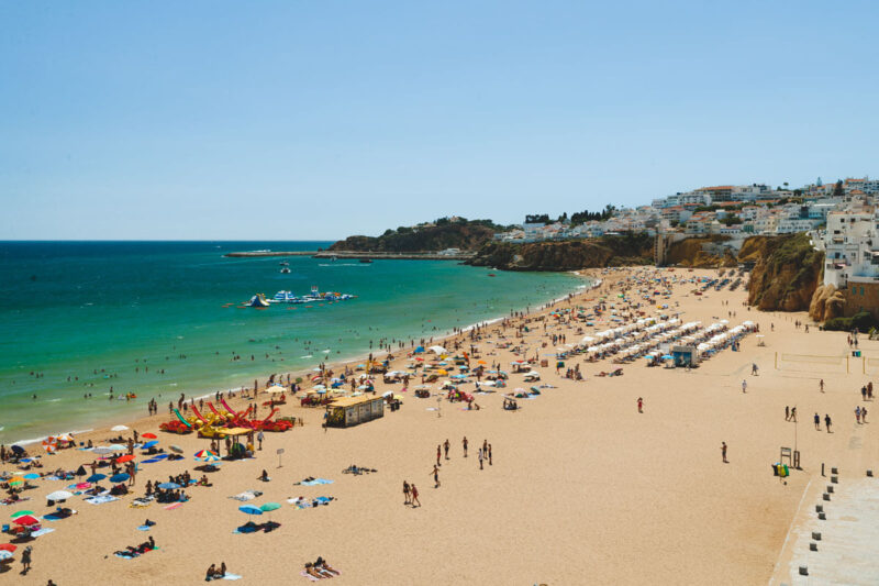 Crowds on Praia Albufeira one of the best beaches in Albufeira