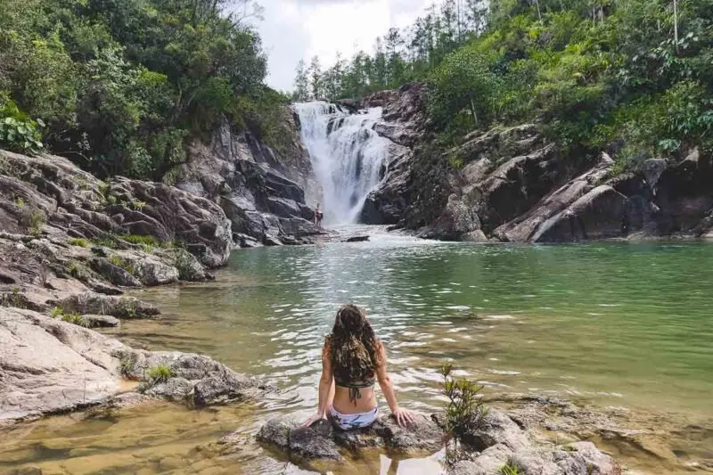 Woman at Big Rock Falls for things to do in Belize