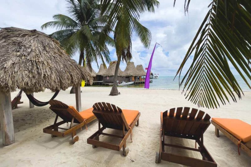 Sunloungers at Ramon Village Beach, one of the must-visit beaches in Belize