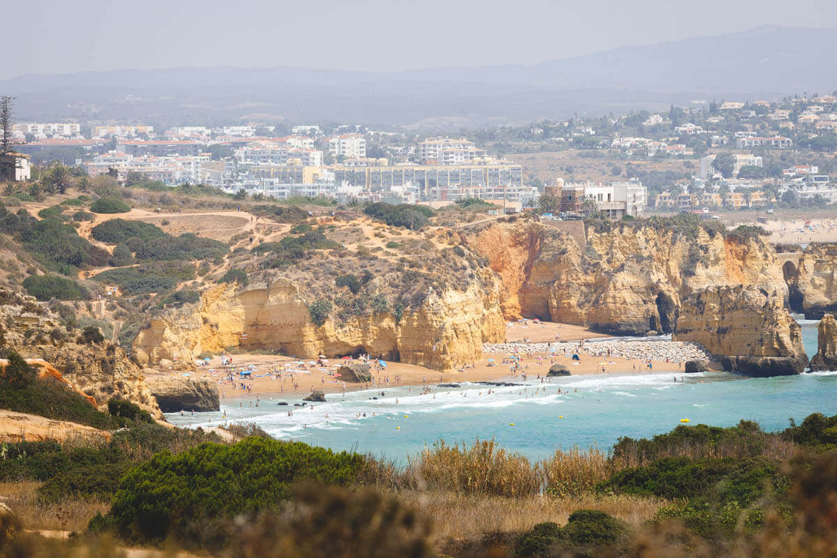 For places to visit in Lagos, catch this beach view at Ponta da Pieadade.