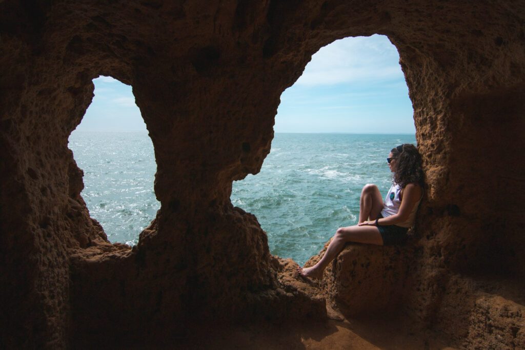 Sitting in the rock windows at Algar Seco is one of the best places to visit in Lagos.