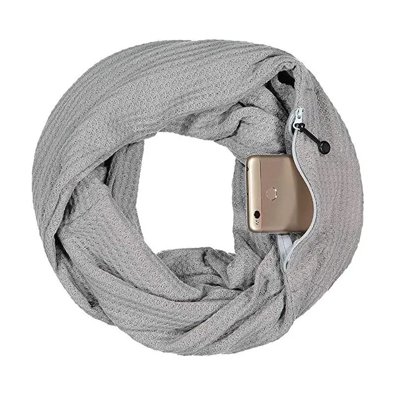 Gray scarf with pocket for best travel accessories