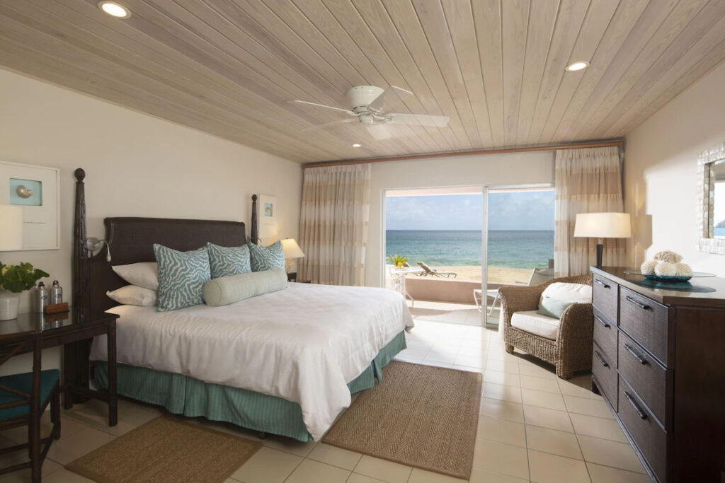 This bright and airy room is a beautiful example of Curtain Bluff Resort.