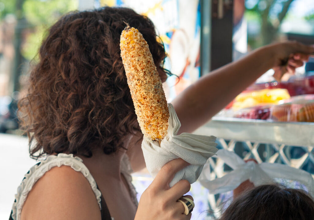 Eating elote while traveling Mexico