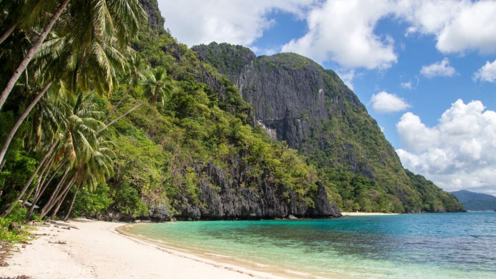 Visit Pasandigan Beach on Cadlao Island, El Nido on a tour.