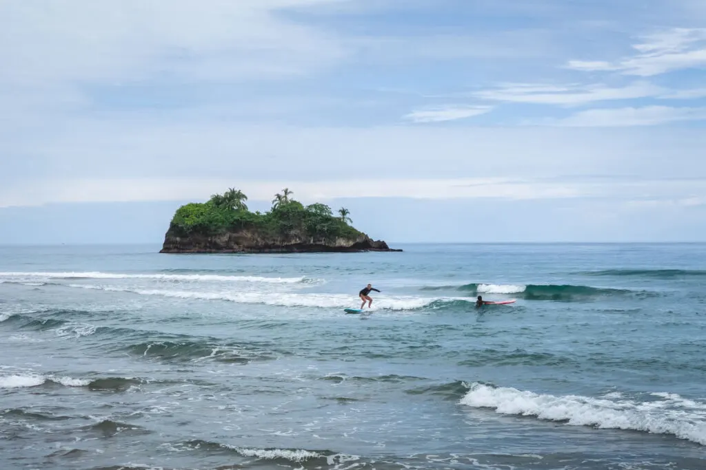 Take up surfing lessons in Playa Cocales Puerto Viejo as a backpacker in Costa Rica.
