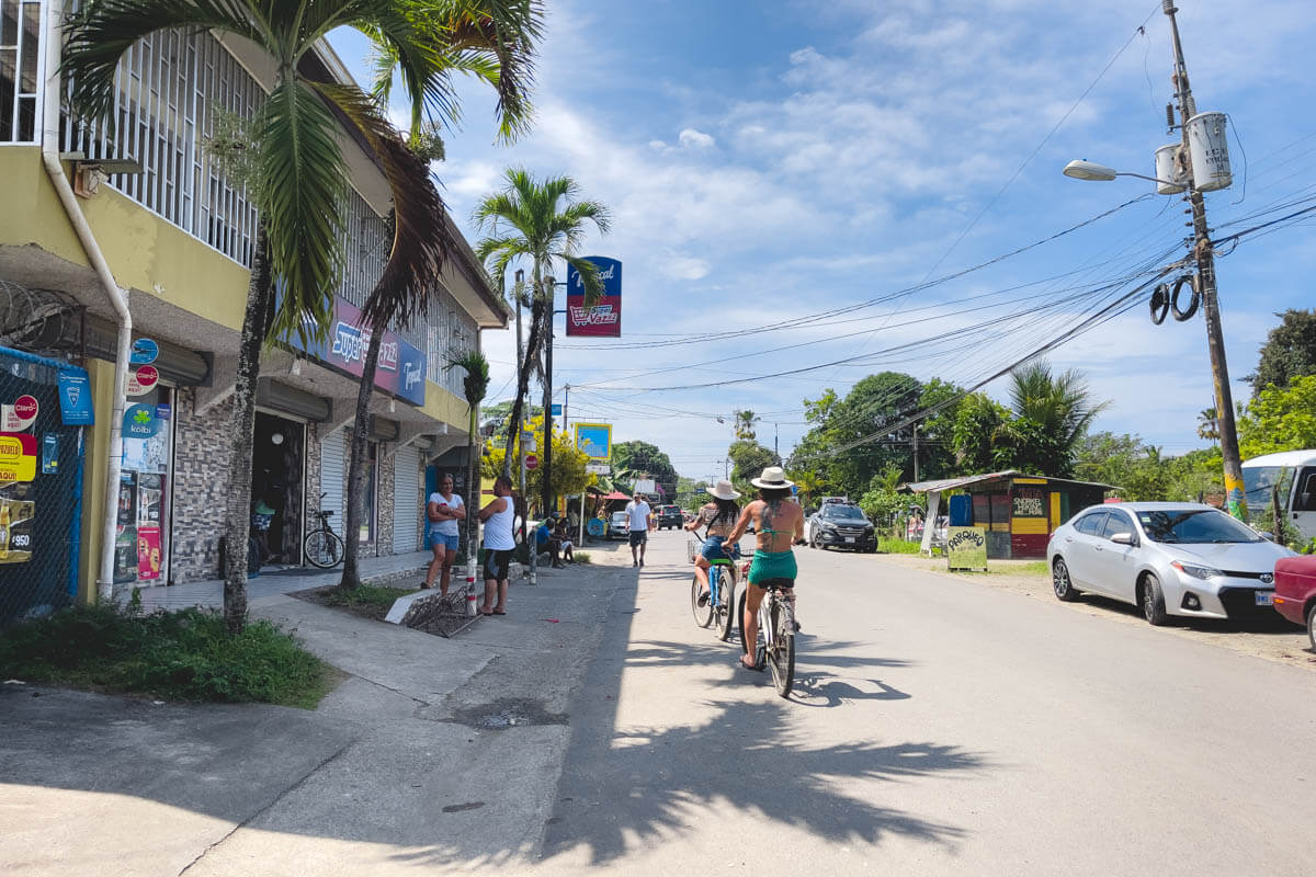 People biking in the streets in Costa Rica.