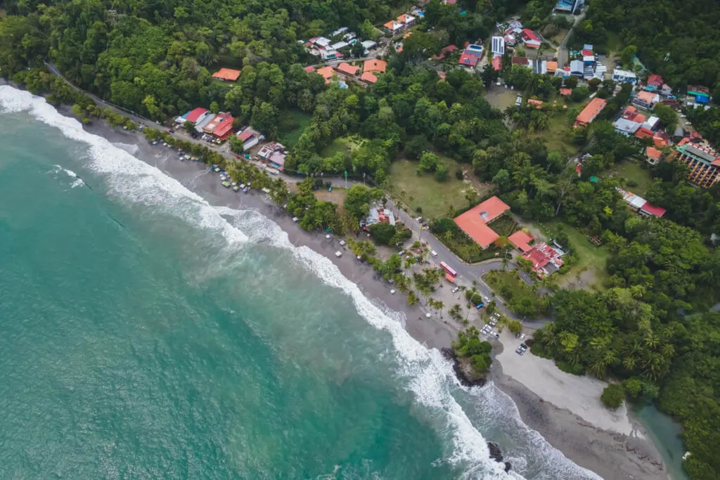Aerial drone shot of the town in Manuel Antonio National Park.