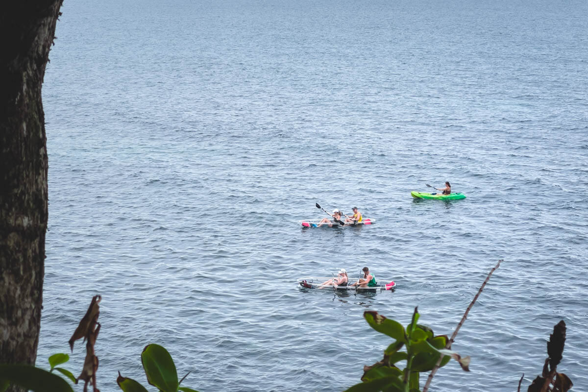 Tourists in transparent canoes near Punta Uva. Tourists in transparent canoes near Punta Uva.