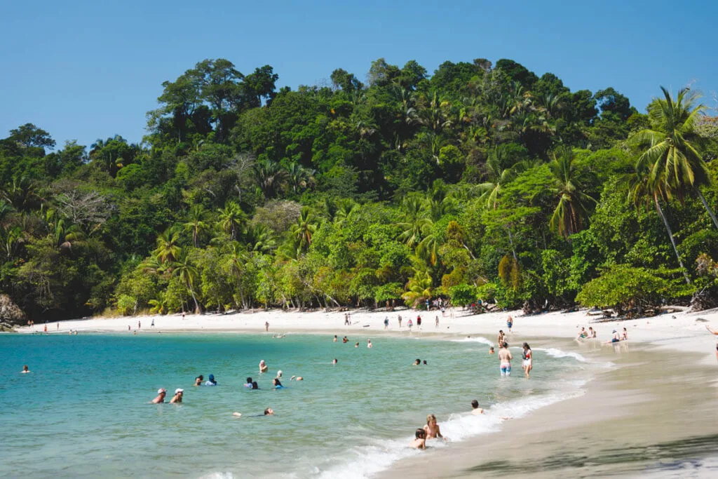 A lot of tourists on Playa Manuel Antonio in Costa Rica.