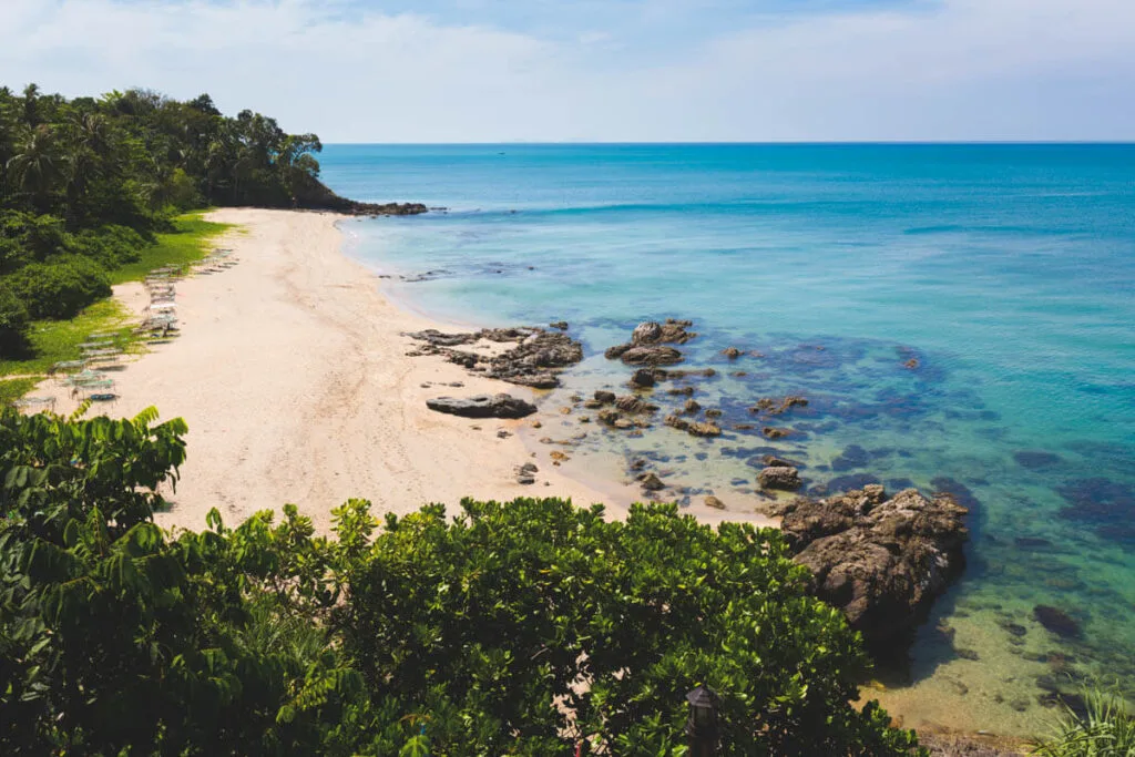 A secluded and empty white sand beach on Koh Lanta in Thailand. A secluded and empty white sand beach on Koh Lanta in Thailand.