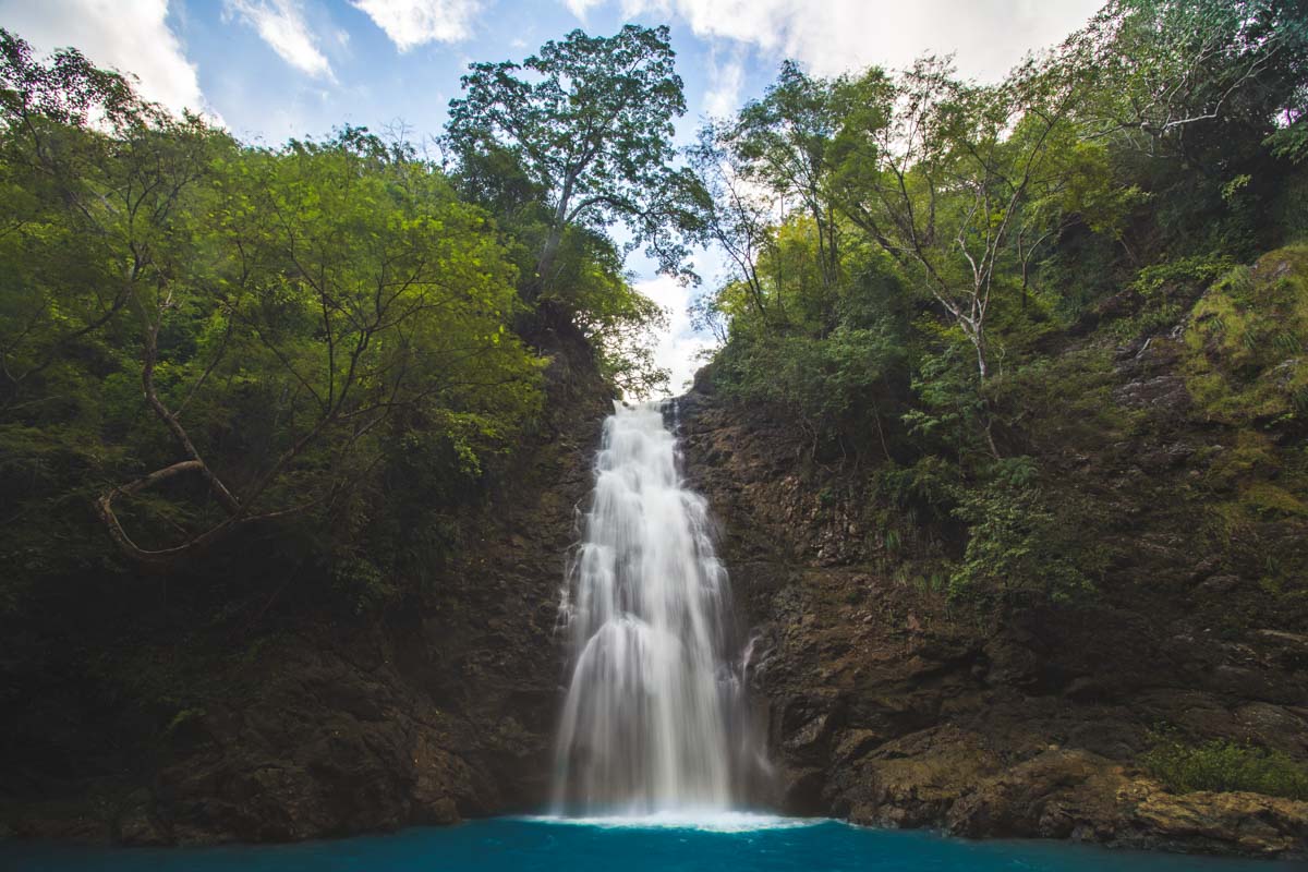 A long exposure of Montezuma Waterfall surrounded by the Costa Rican jungle.